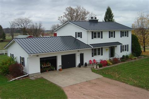 charcoal grey metal roof white brick house|gray metal roofing ideas.